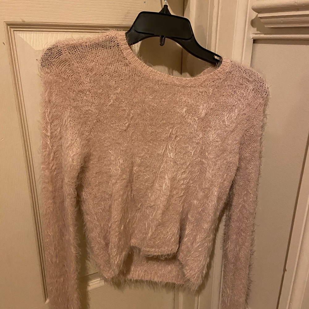 Light pink furry sweater.